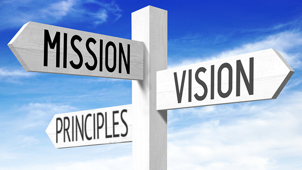 road signs reading "mission," "vision" and "principles"