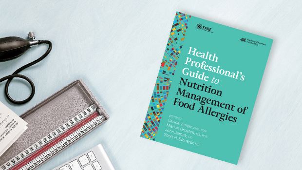 Health Professional's Guide to Nutrition Management of Food Allergies book on a registered dietitian nutritionist's desk