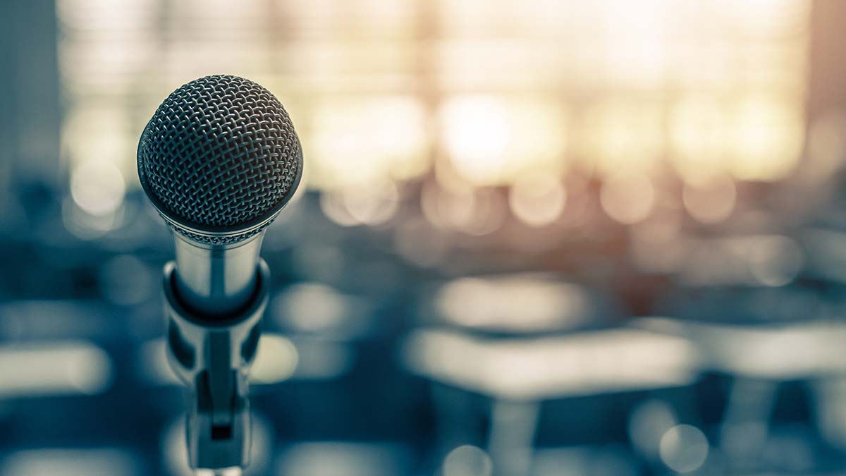 Microphone voice speaker in business seminar, speech presentation, town hall meeting, lecture hall or conference room in corporate or community event for host or townhall public hearing