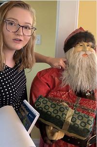 An image of Eileen Hoag and a holiday decoration