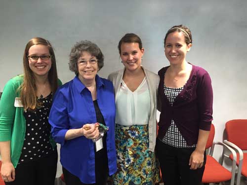 A picture of three interns standing with a preceptor