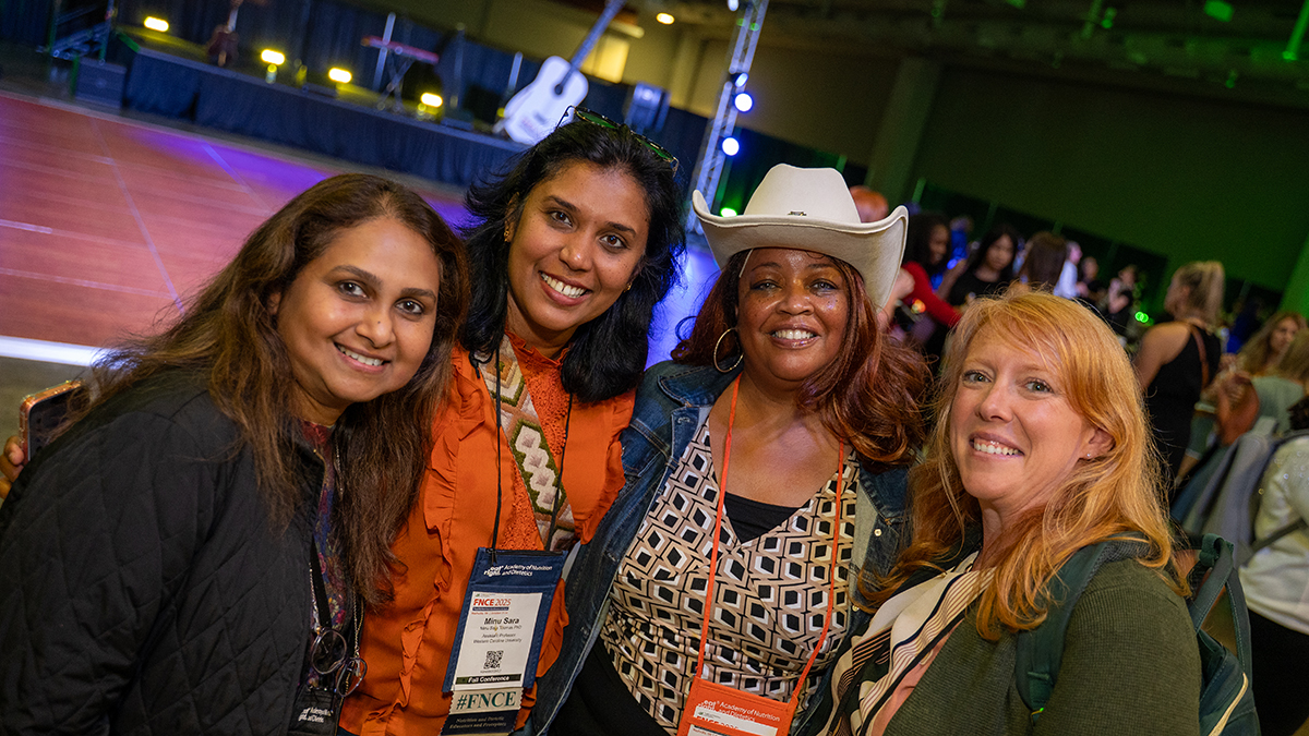 FNCE Welcome Party | Group of 5 People Dancing in Bar Wearing Cowboy Hats