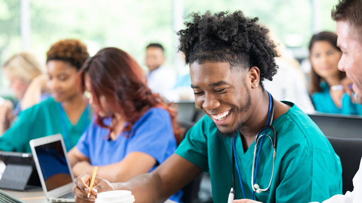 Medical student smiling during class