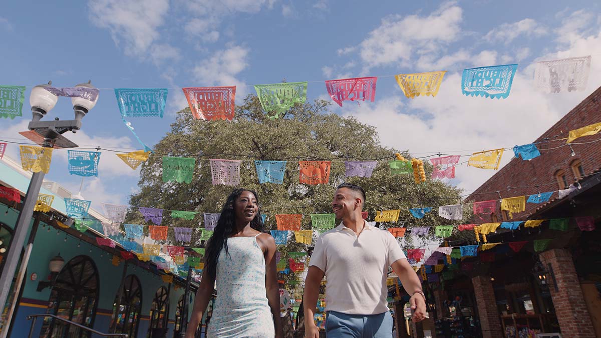 A Couple Walking Through Market Square in San Antonio