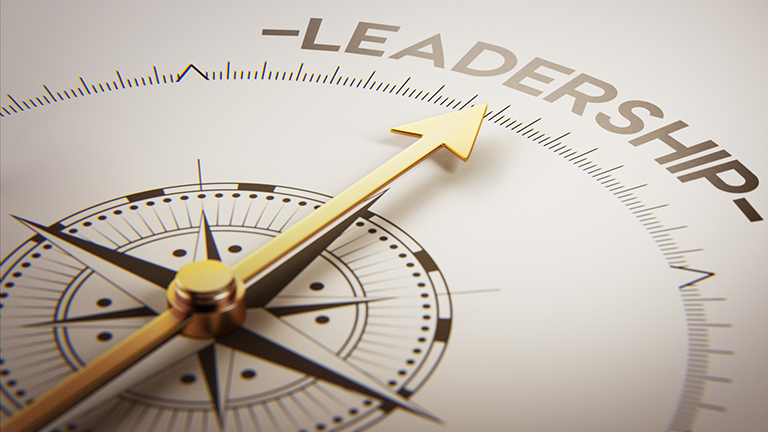 compass pointing to word "leadership"