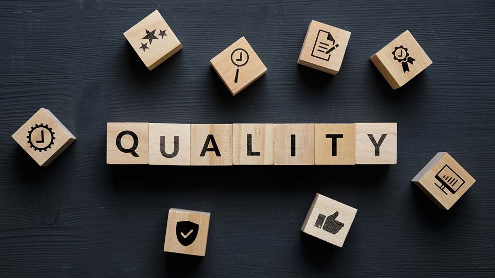 Quality written on sides of wooden blocks