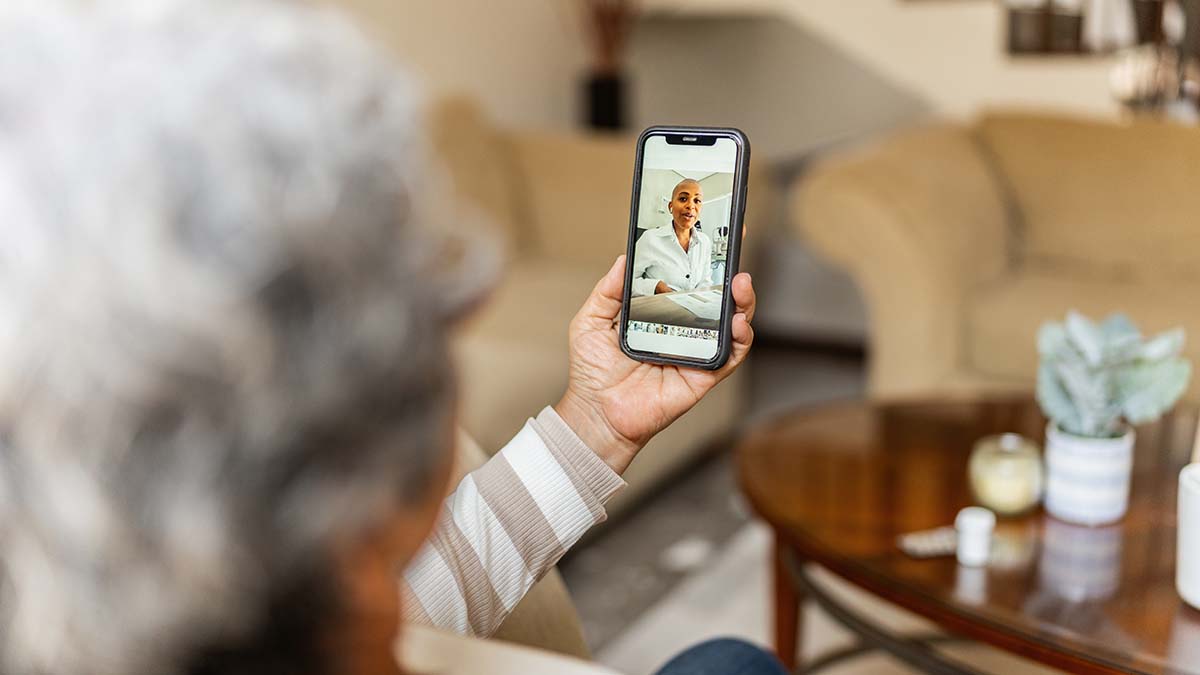 Telehealth Nutrition Services | Senior woman talking on video call during telemedice at home