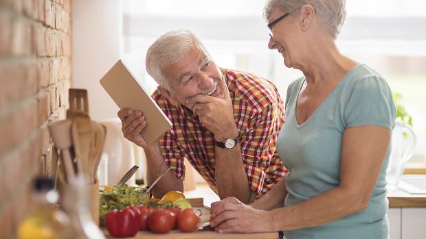 Older couple eating healthfully thanks to nutrition programs.