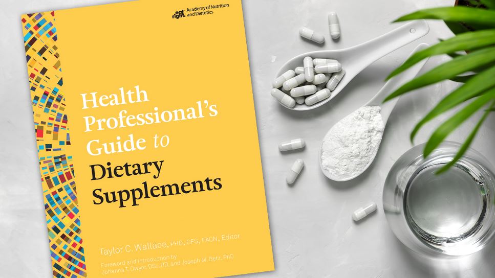 Copy of Health Professional's Guide to Dietary Supplements lying on a desk.