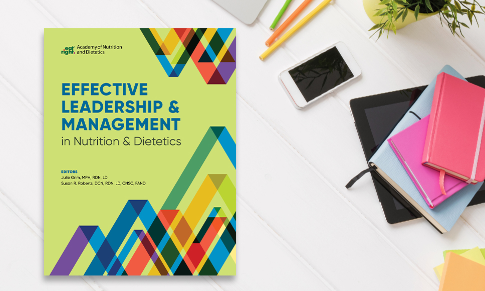 Effective Leadership Management book sitting on a health care professional's desk.
